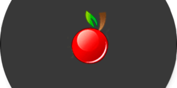 A black circle with an apple on it available at Slots Capital Casino.